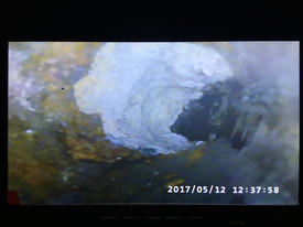 Camera inspection reveals grease buildup easily removed with a high pressure jetting from Econo Drain